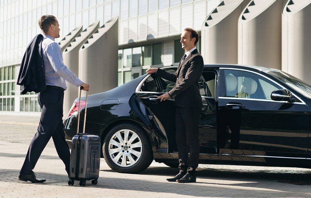 Chauffeur opening door