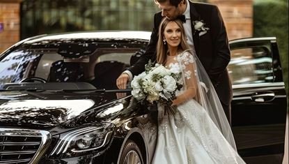 Black car at wedding venue